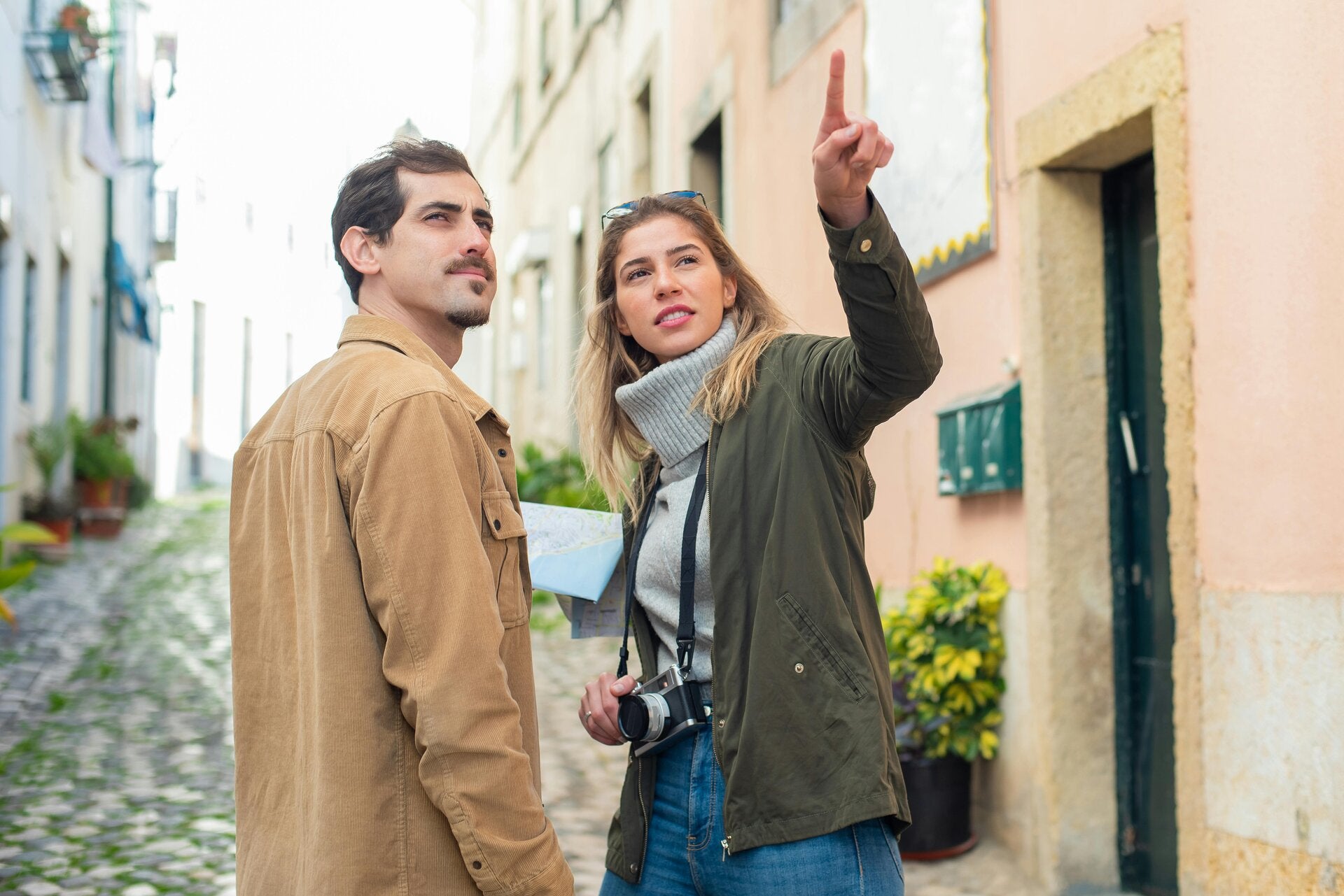 Two tourists exploring a city street